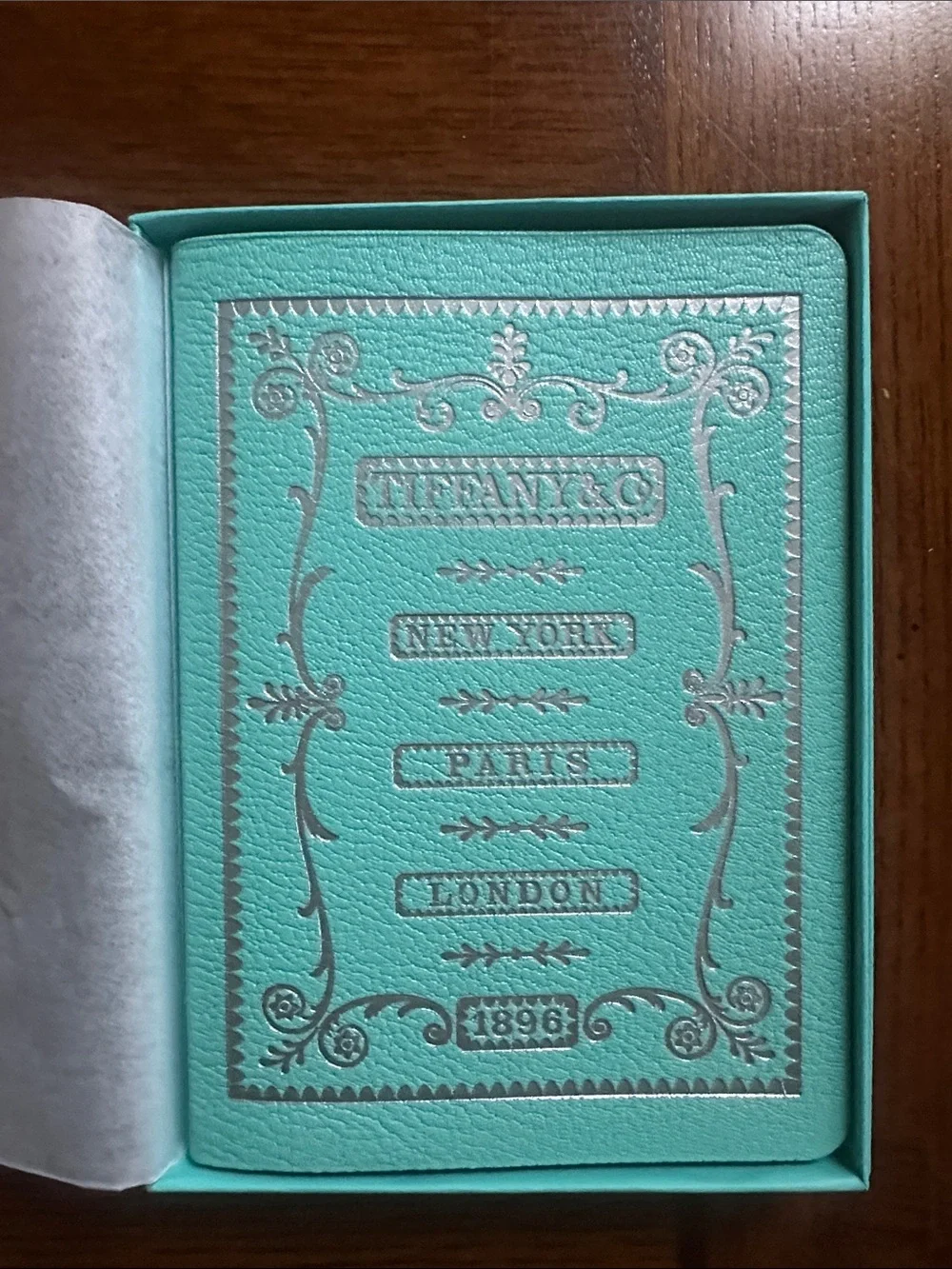 Tiffany & Co. aqua blue leather notebook with silver foil